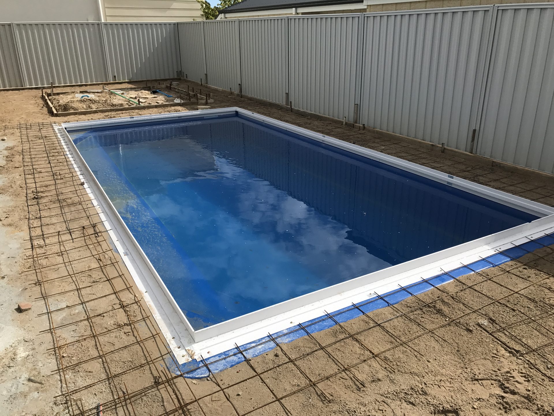 Pool Surrounds — Before