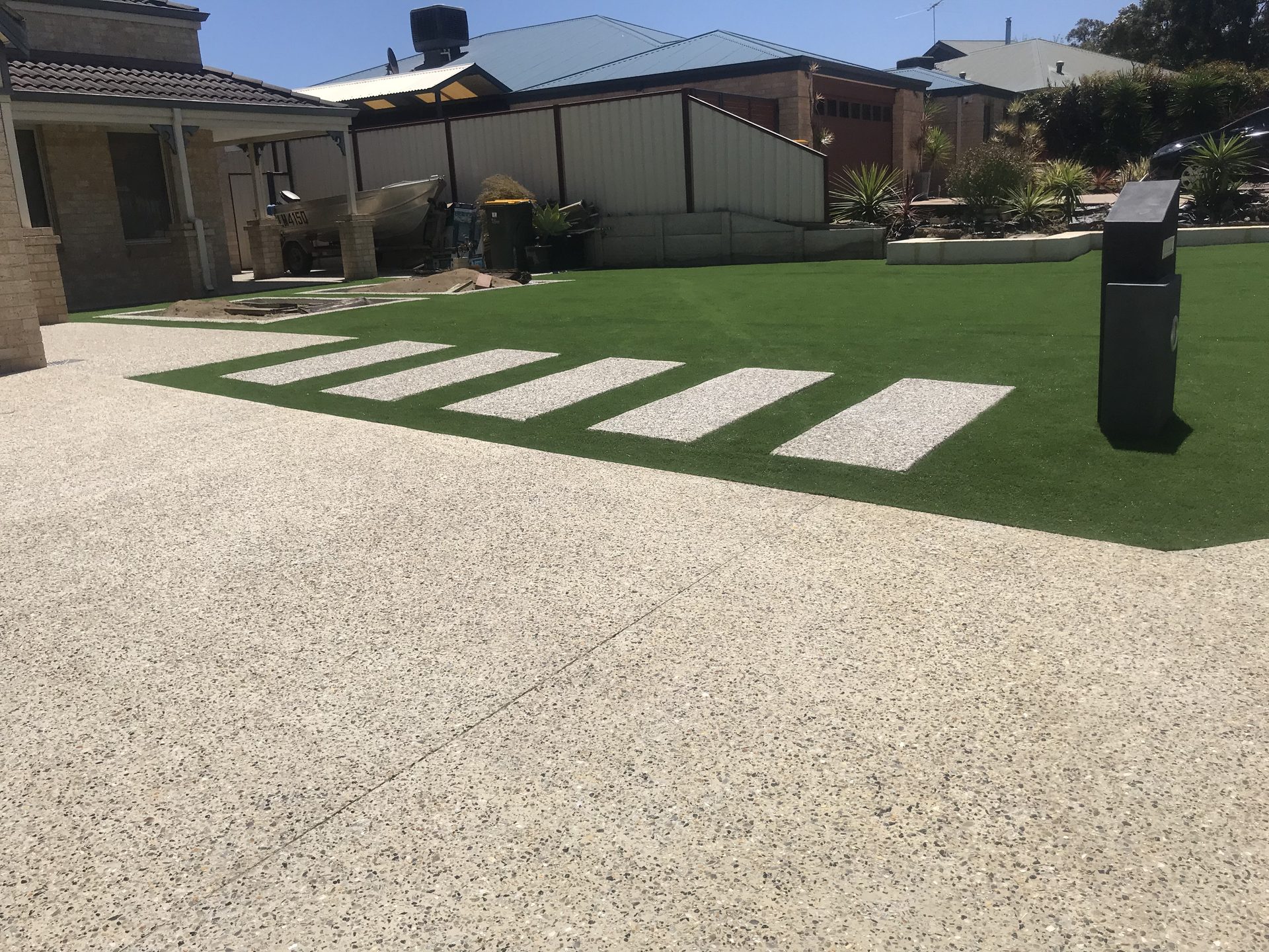 Exposed Steppers & Driveway